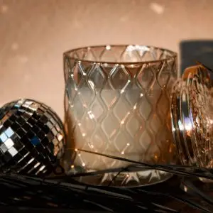 luxury coconut wax candle in a cathedral style decorative candle, iridescent, in the sent i am sacred by set and setting